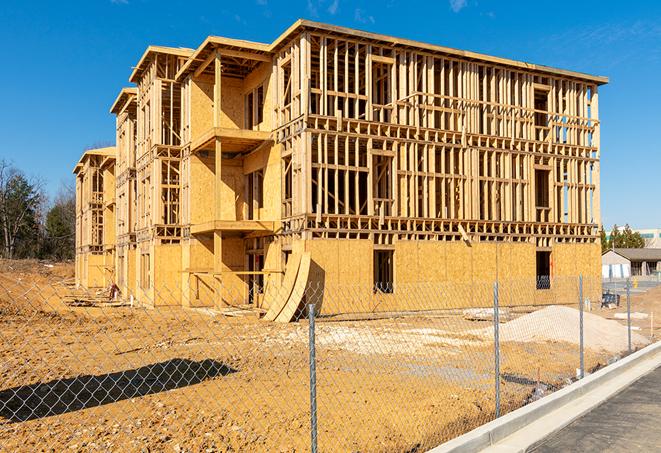 a view of a temporary chain link fence that surrounds a construction site, providing security in Mauriceville, TX